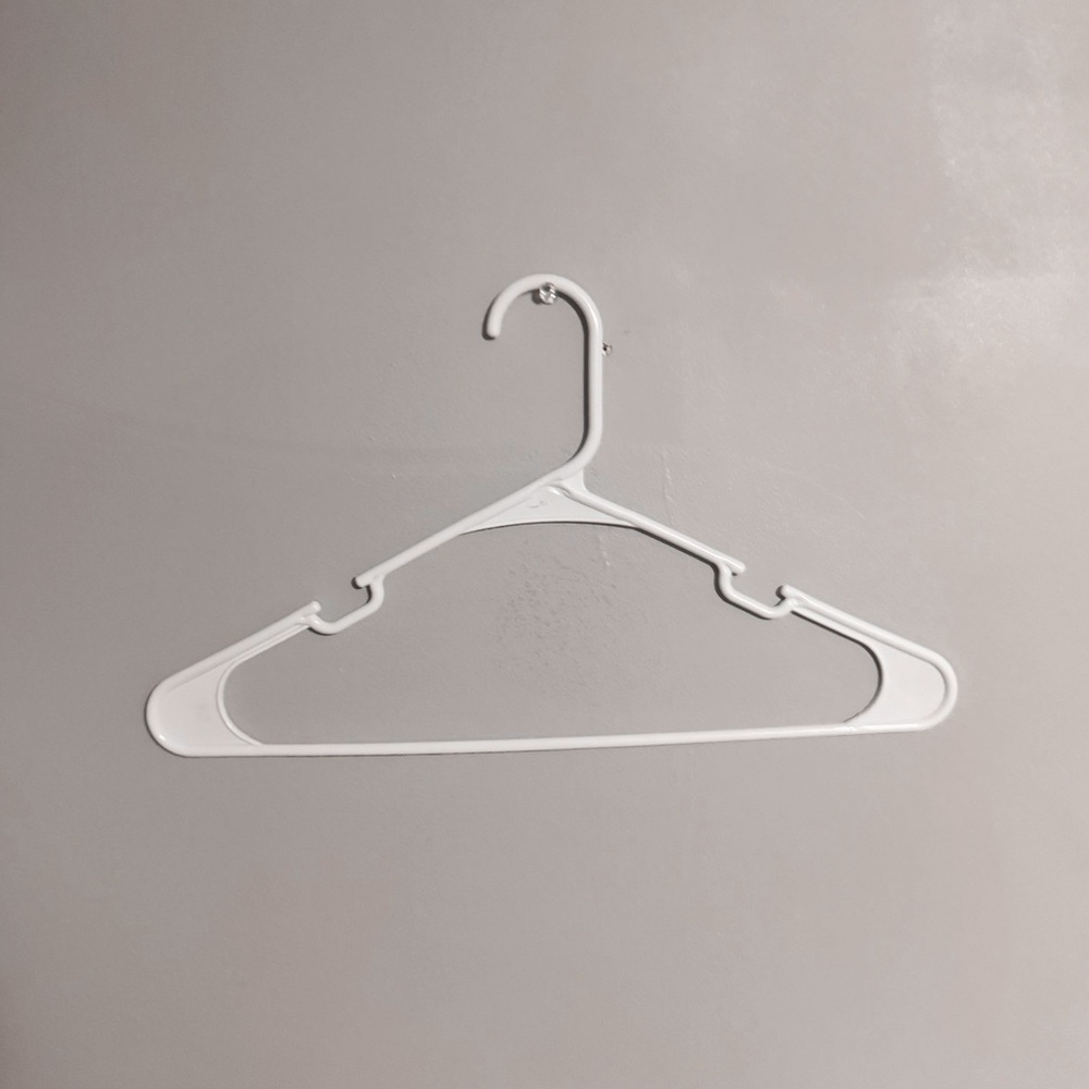 White plastic hangers with hooks